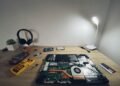 Small home bitcoin lottery mining hardware being set up on a desk