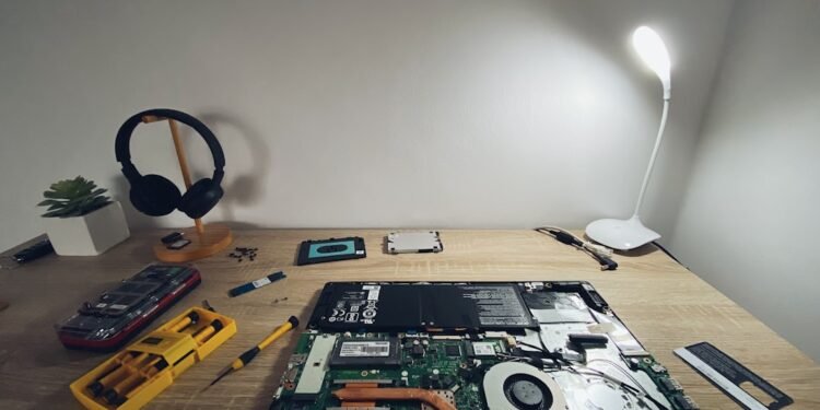 Small home bitcoin lottery mining hardware being set up on a desk